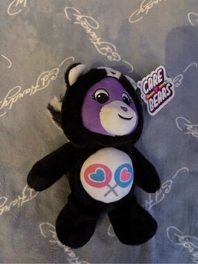 Care Bears Black and Purple Plush Bear with Heart Paddle Belly Badge